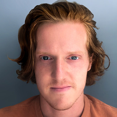 J.Taikina Headshot.jpg