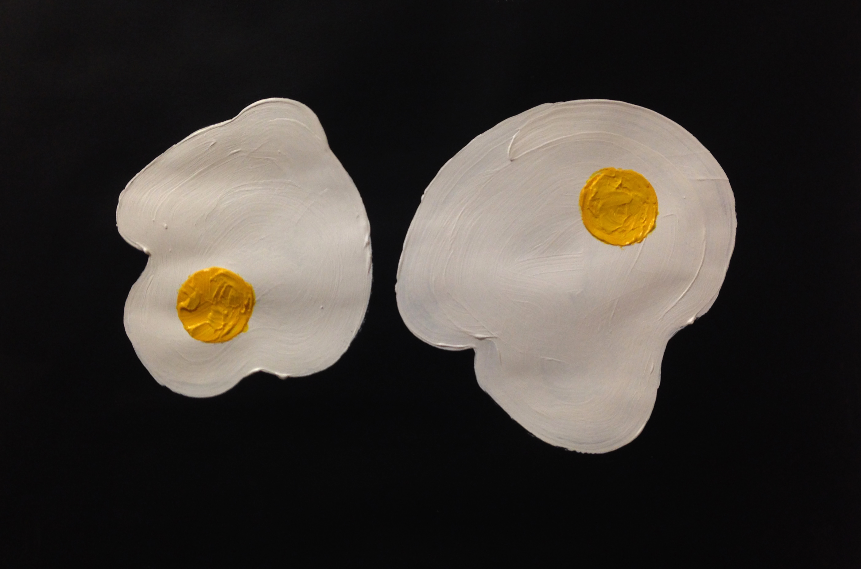 TWO FRIED EGGS