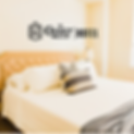 Hotel Room with Bed and The Crazy Water Hotel logo