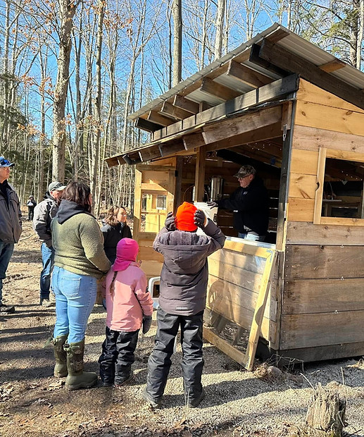 group around sugar shack.jpg