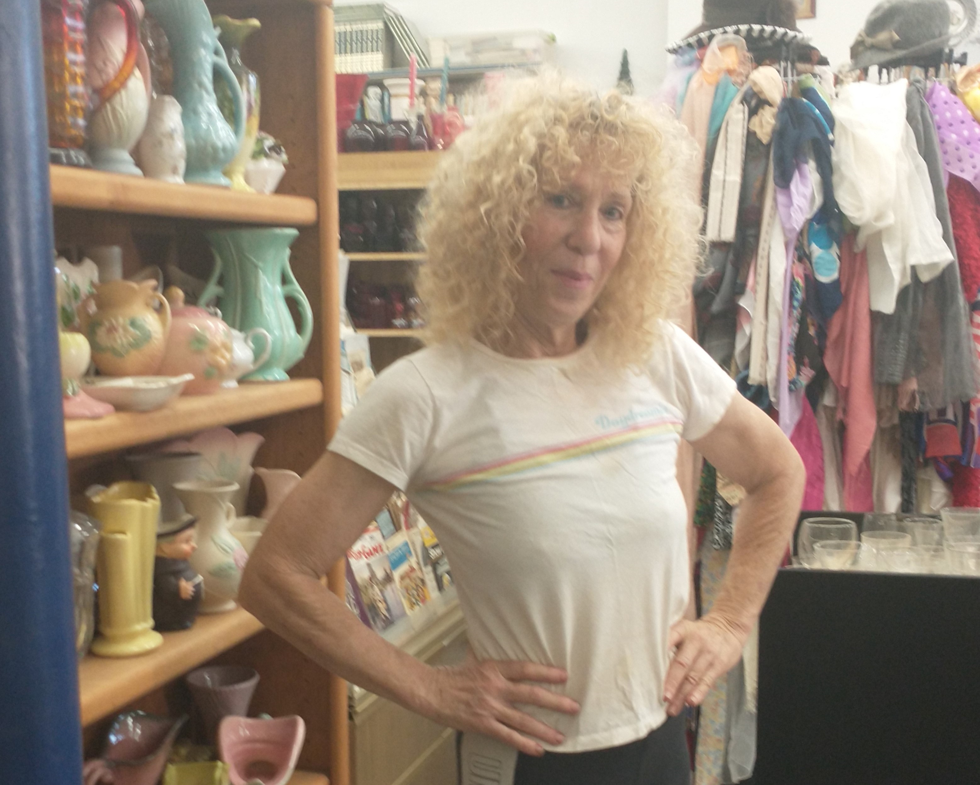 Alicia Thornton in room with vases clothes and other materials for Mixed media Assemblage