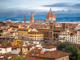 An article about slowing down when you travel in Italy. It talks about places like Rome, Florence, Tuscany, Venice, Bologna, Modena, and Positano, and how the best moments are simple ones like having coffee in the morning, enjoying long meals, watching the sunset, and spending time with people you love. The main idea is to stop rushing, be present, and really enjoy where you are instead of trying to see everything.