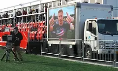 An Old Glory DC LED billboard truck operated at a live professional rugby event beside team merchandise while a videographer captured the activation. The campaign used Experiential Advertising to support Branding & Market Presence for the Washington, DC club and engage fans where they had gathered.