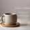 Thumbnail: Ceramic Coffee Cup with Wooden Saucer | Minimalist Beige Stoneware Latte Mug