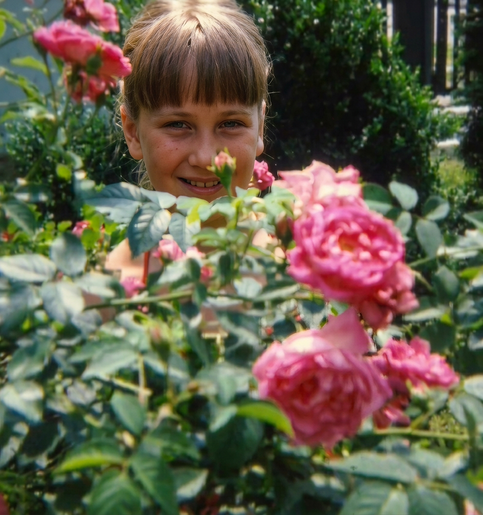 Founder working with blooms