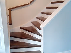 Hardwood stairs and white risers