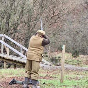 Man shooting a gun at Logiealmond Estate