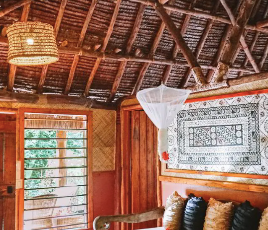 Thumbnail: thatched Fijian cottage interior