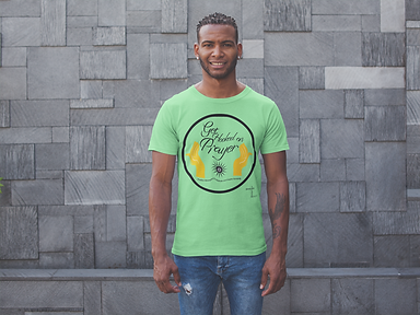 mockup-of-a-smiling-man-wearing-a-tshirt-standing-against-a-modern-stone-wall-20744.png