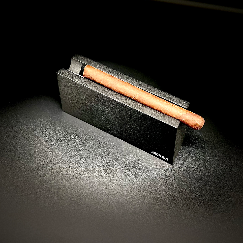 primamateria-cigar-ashtray--black-grain with a cigar