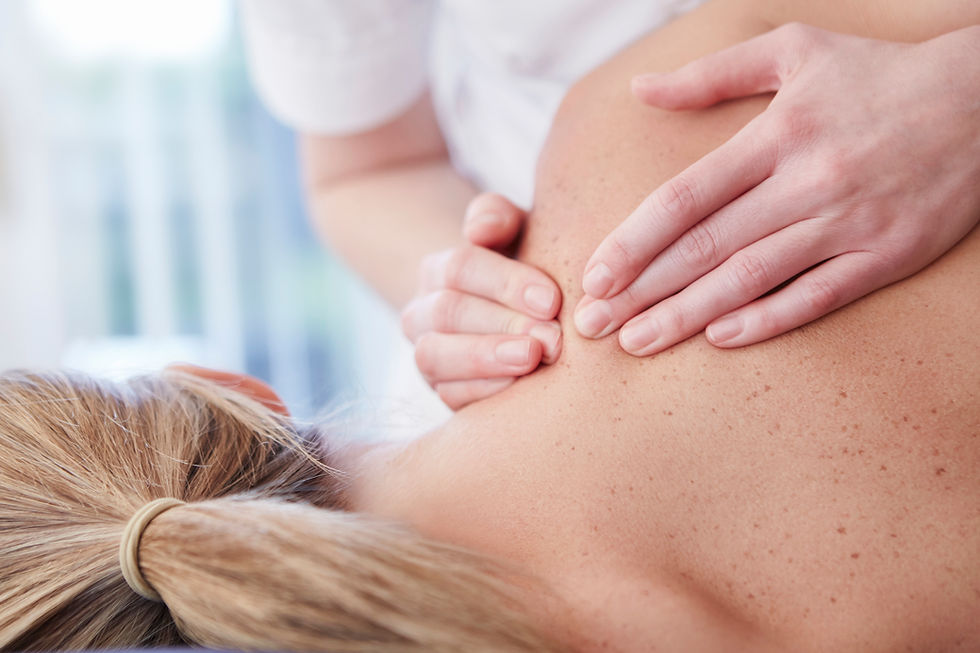 Woman receiving shoulder massage