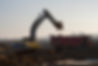 digger loading a truck