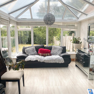 Conservatory with a sofa
