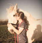 Girl kissing horse