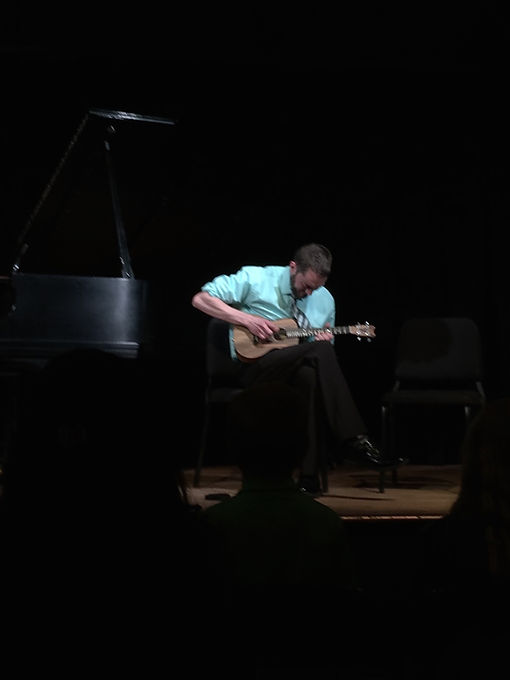 Ukulele performance at student recital.