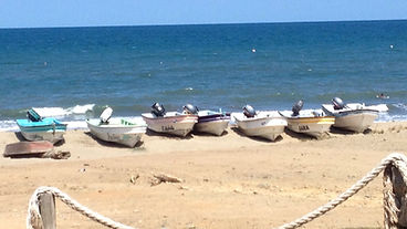 Fishing boats on Playa El Arenal in Pedasí, Panama