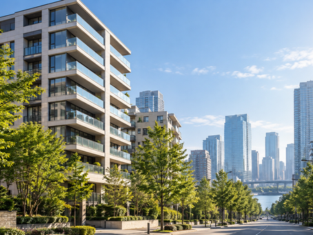 都心のマンションと街路樹のイメージ画像