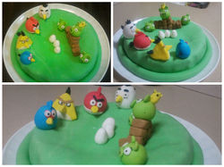 עוגהעם פיסול של האנגרי בירדס וחזירים