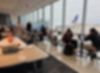Travelers relaxing at the United Club in Chicago O'hare Airport