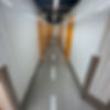 A hallway of storage units in a storage facility.