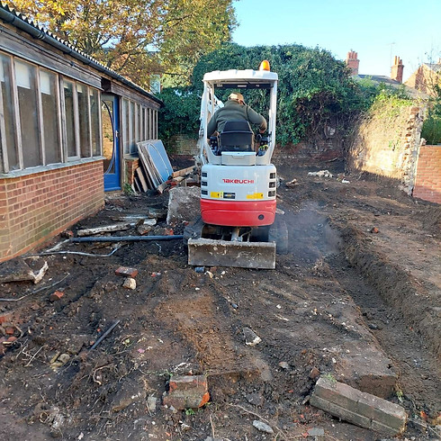 A white digger in use.