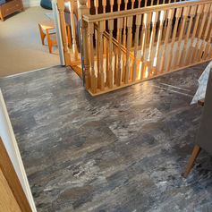 A landing with LVT flooring