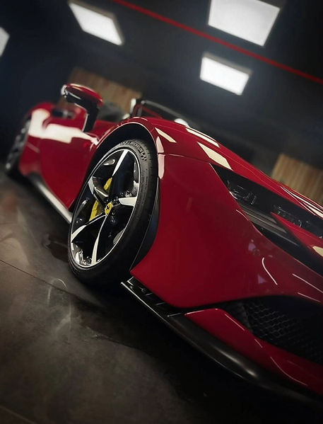 The side of a red Ferrari