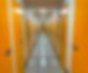 A corridor with self storage rooms.