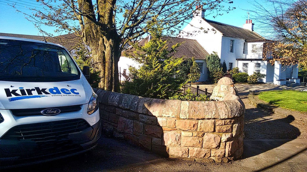 Kirkdec Patining & Decorating van parked outside a house in Strathaven. Exterior masonry painting