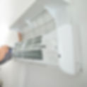 Repairer Repairing Air Conditioner_edited.jpg
