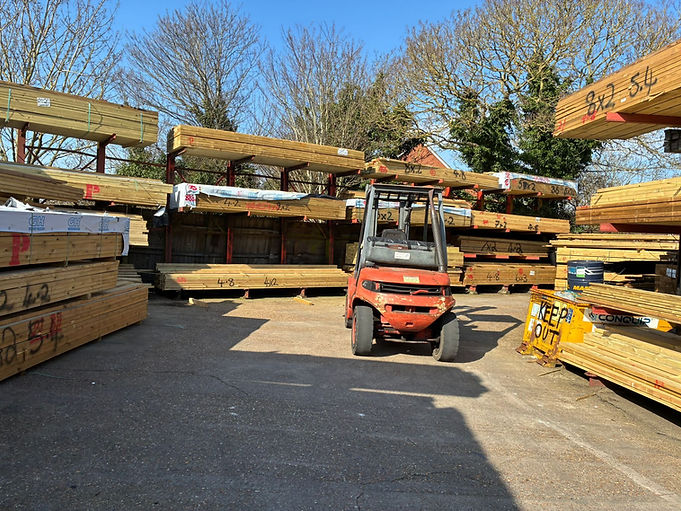 A vehicle in a timber yard