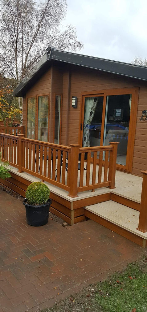 Brown lodge with decking