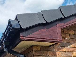 A domestic roof with cladding.