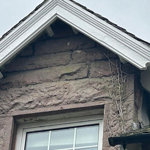 The exterior of a brick building.