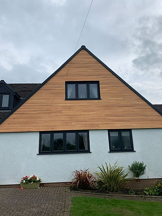 A modern house with a guttering system.