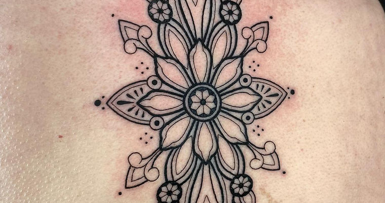 Body-flow ornamental tattoo pattern in Soho London.