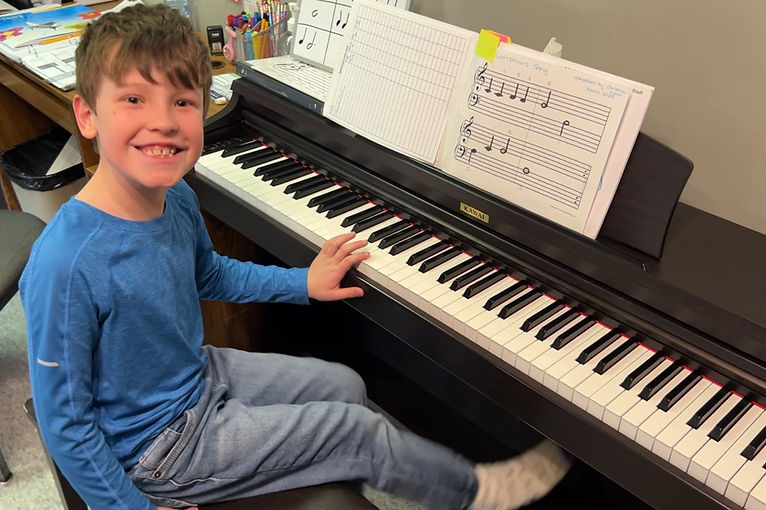 Student at Piano Lessons