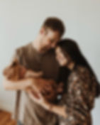 Austin and Thea Troendle, with their daughter, Sage.