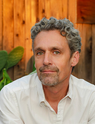 Headshot of Charlie Pizarro.