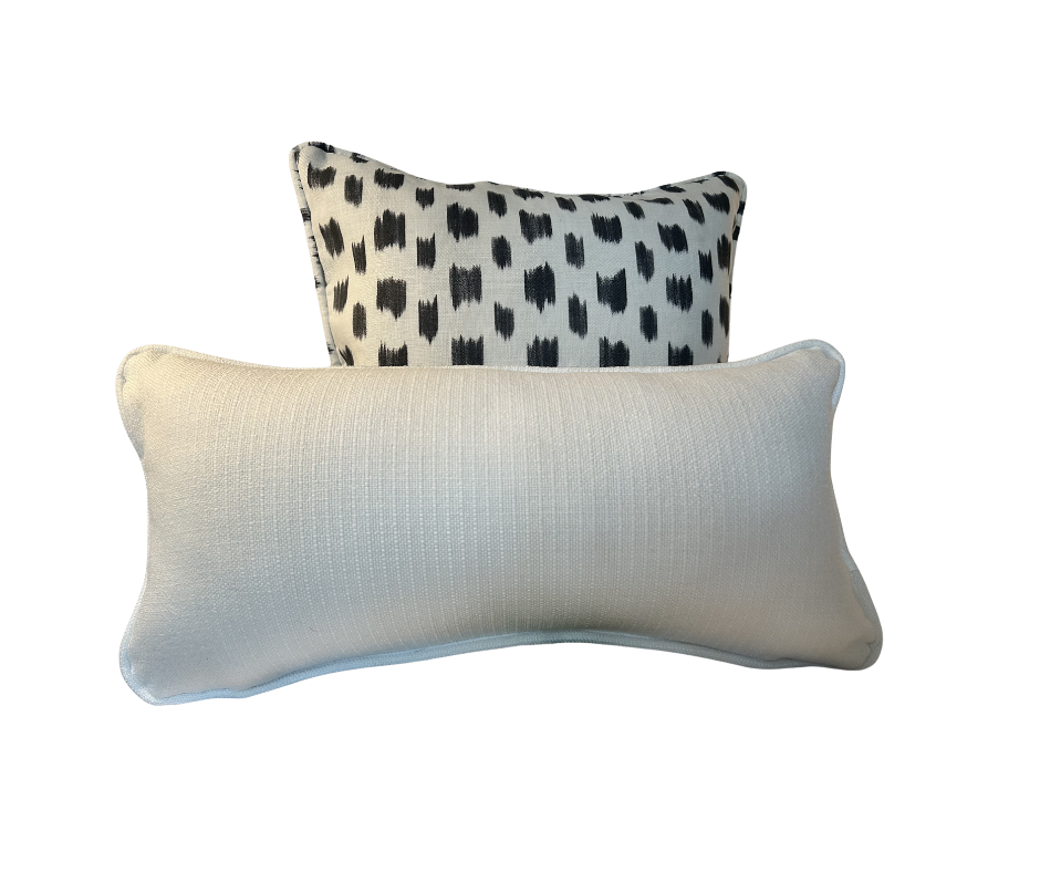 Add a touch of elegance to your space with this custom white pillow cover, showcasing a tone-on-tone contemporary textural ma