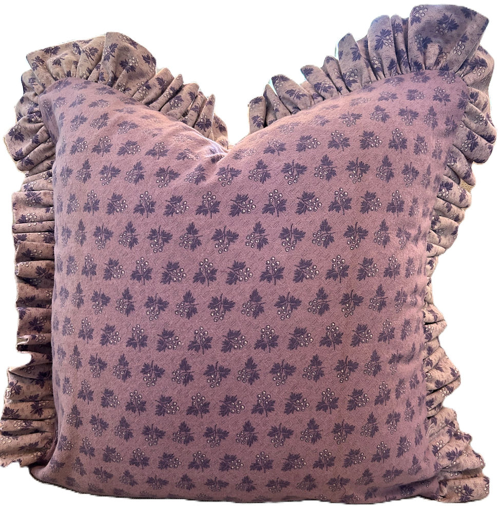 The Purple Ruffled English Country Throw Pillow Cover brings a romantic cottage feel to any sofa, reading nook, or layered be