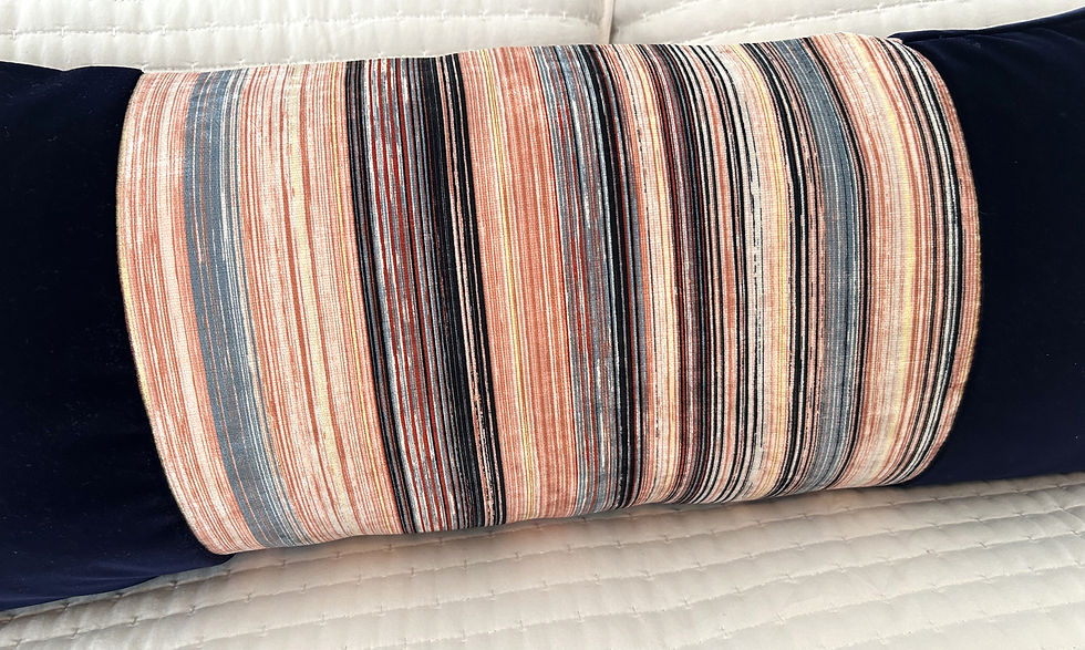 Thumbnail: This Pink Stripe and Navy Velvet Lumbar Pillow Cover combines classic striped detailing with rich navy velvet to create an ef