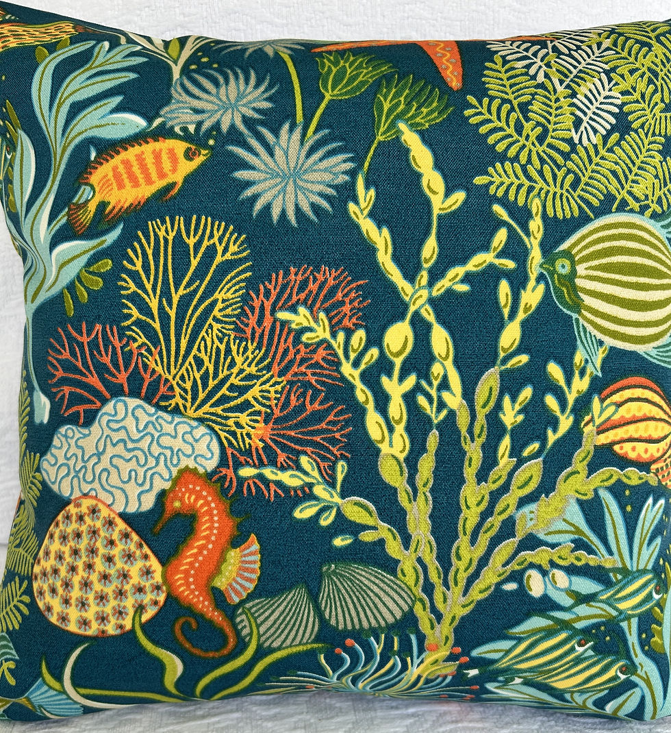 Thumbnail: An OUTDOOR SEALIFE PILLOW Cover that features a multicolor underwater design in green, orange, blue, yellow, and white tones.
