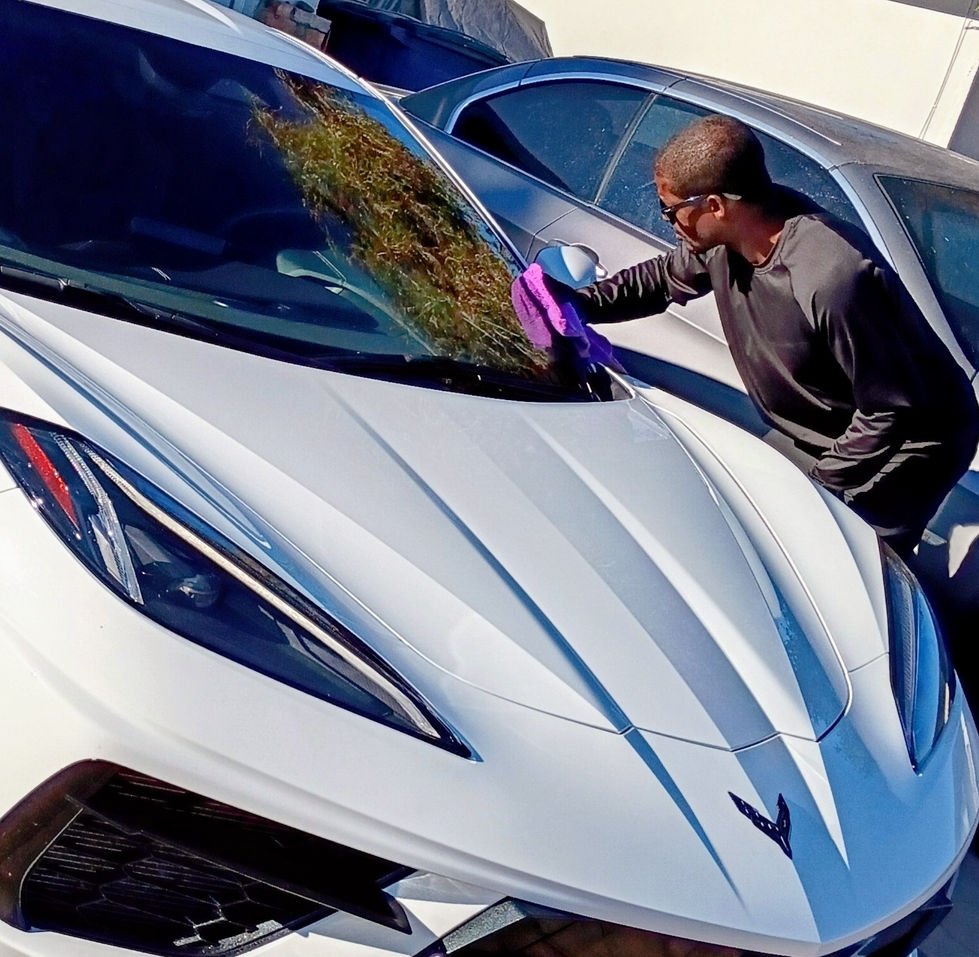 "Mobile car detailing service hand-drying a white Chevrolet Corvette C8 in El Centro, CA — 274 Car Wash on the Spot."