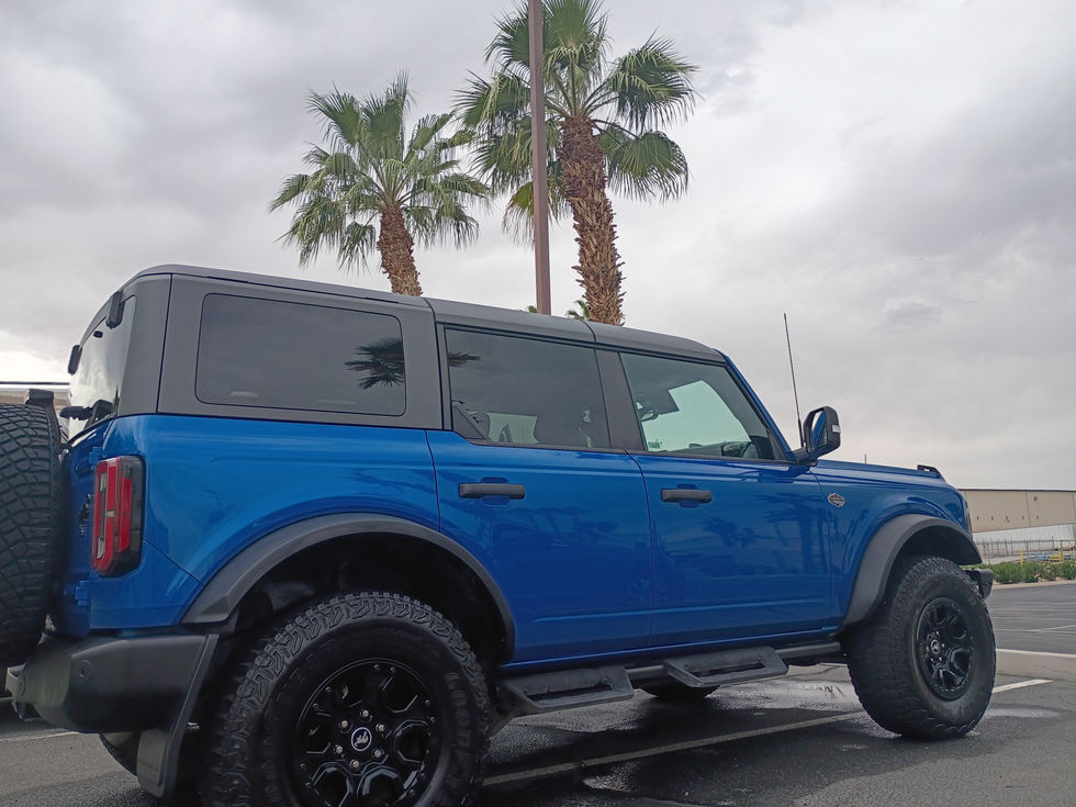 "Ford Bronco Wildtrak detailing in El Centro, CA — close-up of clean paint and tires after a 274 Car Wash On The Spot service