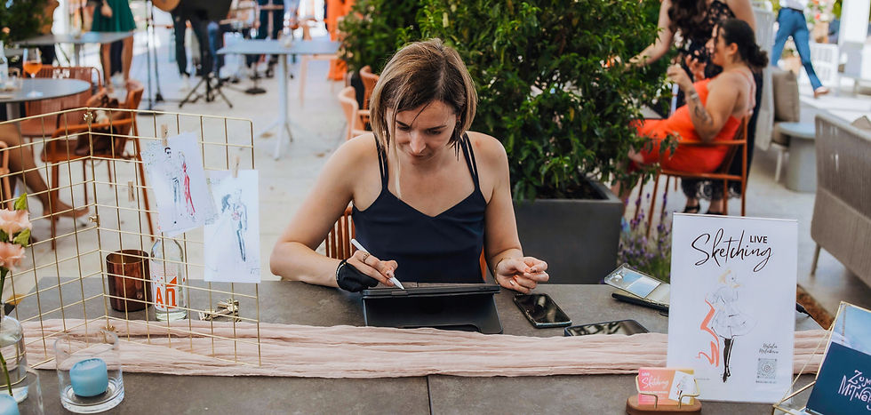 Live Illustratorin Natalia Melnikova zeichnet digital auf einer Hochzeit