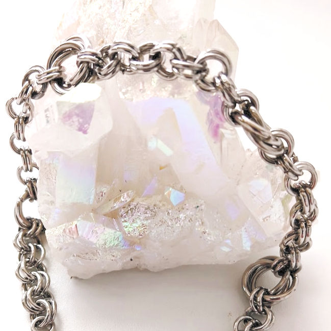 simple double link chain mail bracelet with mobius link feature on a crstal rounded