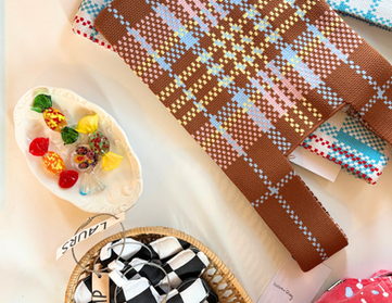 plaid bags and hair clips at fine art fruit shop in portland