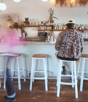 movement near the bar during brunch hour at Bar West in Portland in Nob Hill
