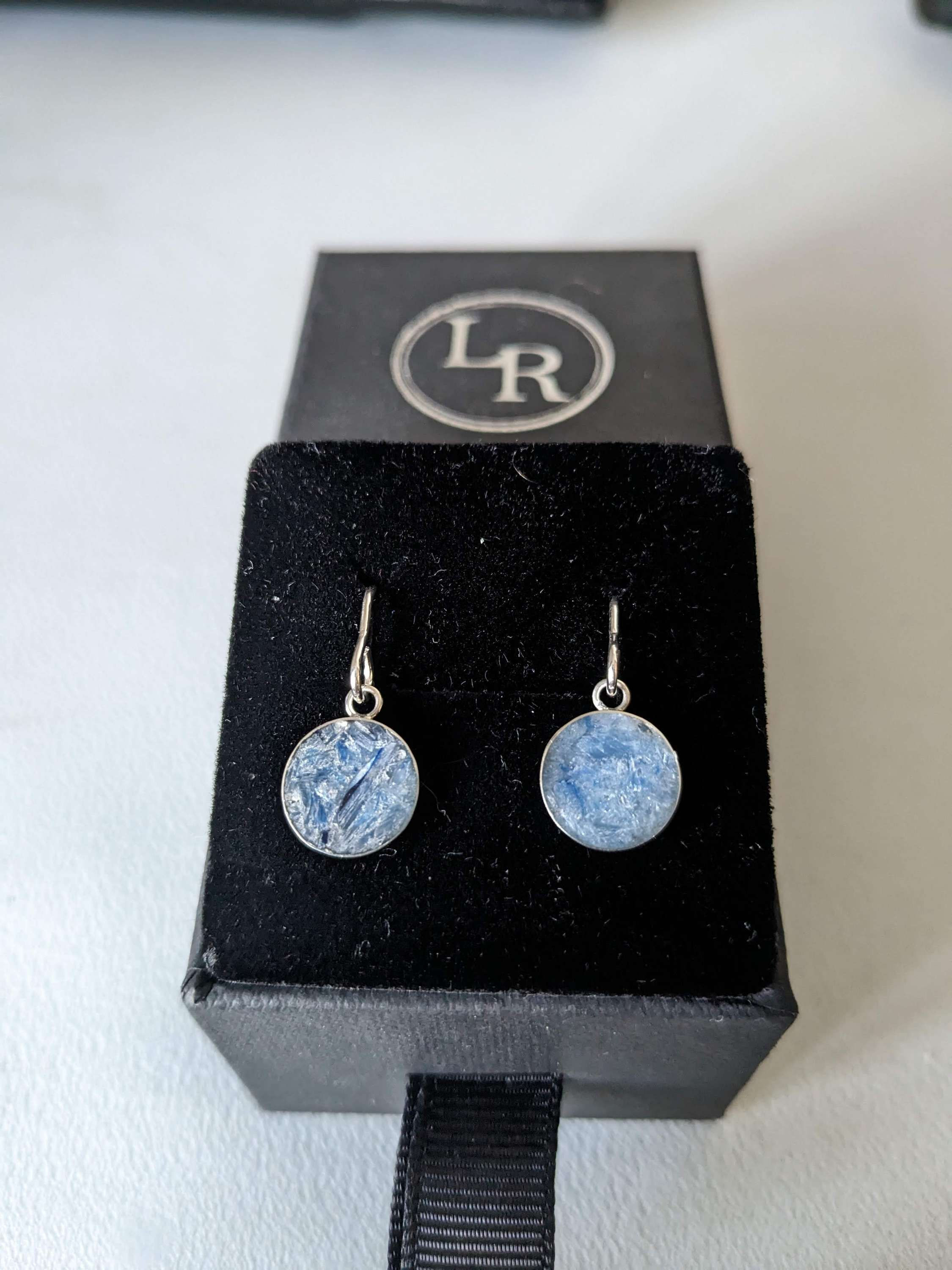 Silver drop earrings filled with blue Kyanite